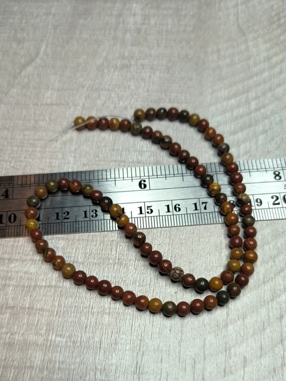 #2- 4mm Natural Red Creek Jasper Smooth Beads 14inch Strand